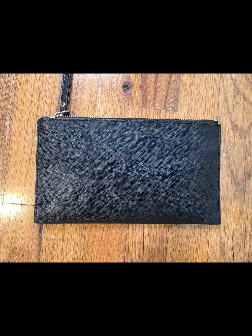 Michael Kors Black Wristlet with Gold Pyramid Studs